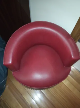 Butaca roja con flecos