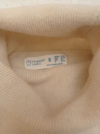 Jersey cuello alto beige