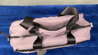 Bolsa de viaje Parfois 15L lila y gris