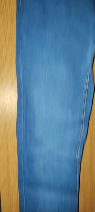 Calças de ganga azuis claras Denim.com