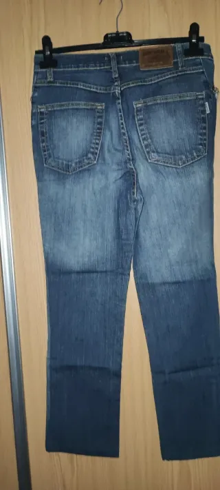 Calças Dippara com bolsos bordados