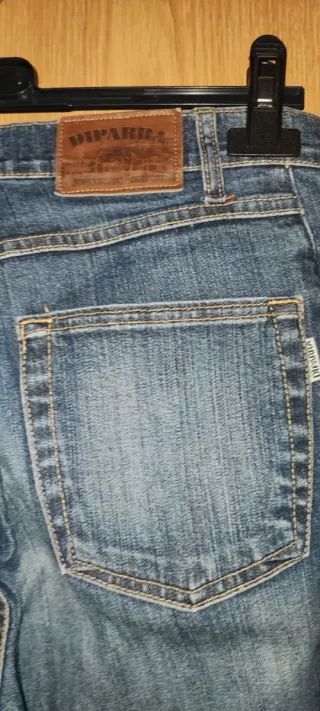 Calças Dippara com bolsos bordados