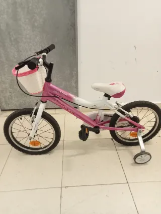 Bicicleta infantil rosa con ruedines, no hago envi