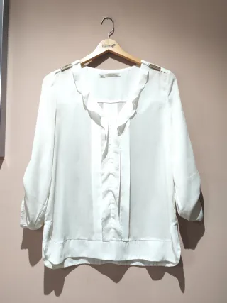 Blusa blanca elegante