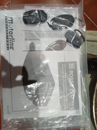 Motor Puerta Garaje , con dos mandos y manual uso.