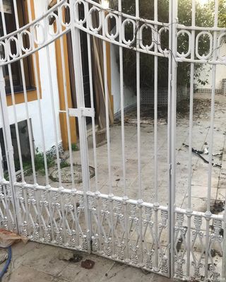 CANCELA: Elegante cancela de dos hojas