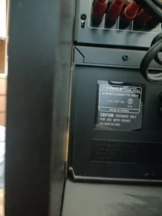 Equipo de música con tocadiscos y mueble