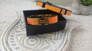Pulsera Hermès H Acero Dorado y Naranja