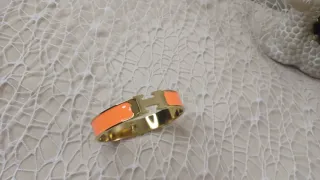 Pulsera Hermès H Acero Dorado y Naranja