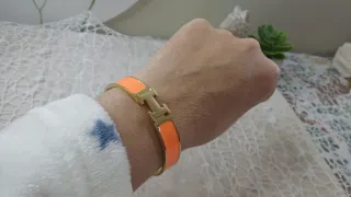 Pulsera Hermès H Acero Dorado y Naranja