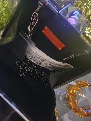 Bolso de fiesta negro con pedrería