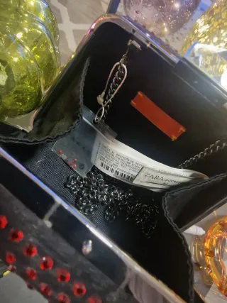 Bolso de fiesta negro con pedrería