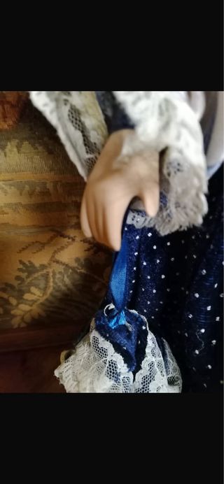 Bambola in porcellana