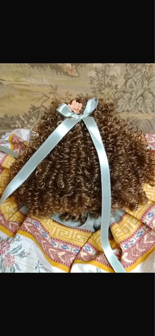 Bambola in porcellana con certificato