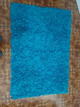 Alfombra azul de tela