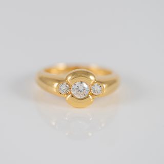 Anillo de oro amarillo 18k y brillantes