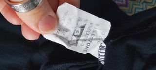 Pantaloni tuta neri e verdi