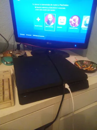 PS4 (PlayStation 4) Negra + Juegos vendo o cambio