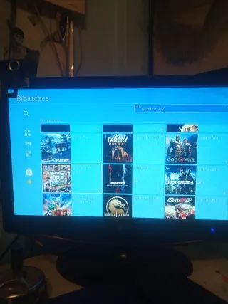 PS4 (PlayStation 4) Negra + Juegos vendo o cambio
