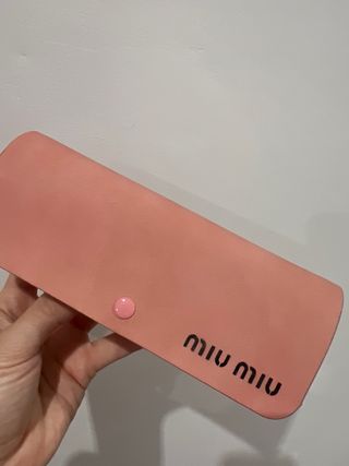 Gafas de sol Miu Miu doradas y marrones