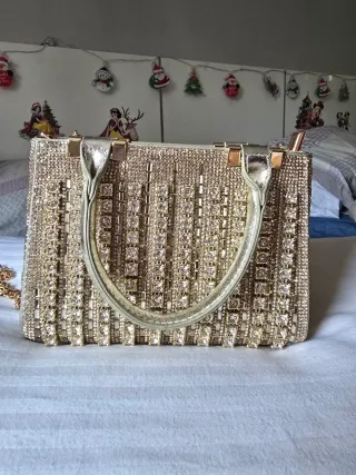 Bolso y cartera brillante de lujo con pedrería