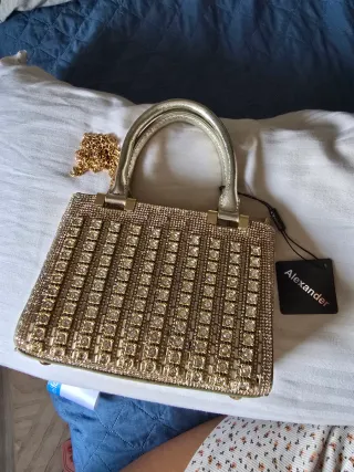 Bolso y cartera brillante de lujo con pedrería