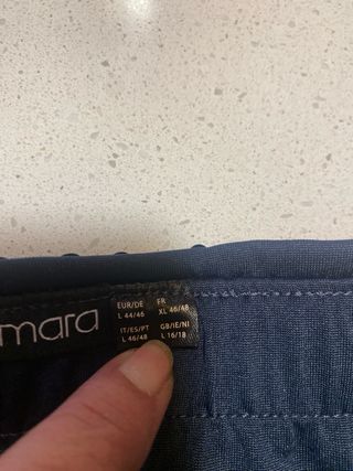 Falda lentejuelas azul marino elástica