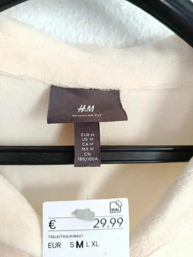 Sudadera beige cuello polo