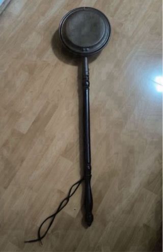 Calentador de cama antiguo de cobre