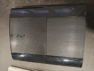 PS3 super slim nera + giochi e accessori