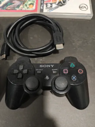 PS3 super slim nera + giochi e accessori