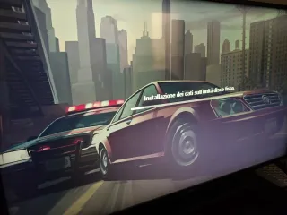 PS3 super slim nera + giochi e accessori