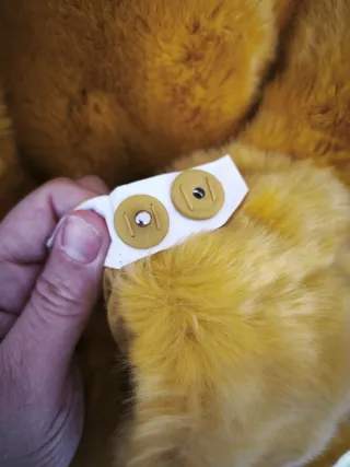 Chaqueta Zara amarilla peluda con capucha