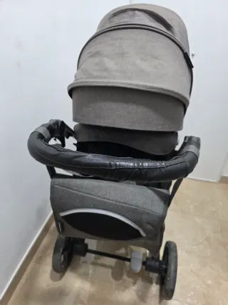 Carro de bebé con silla de coche