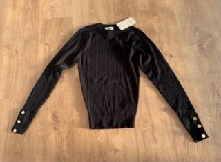 Jersey canalé negro botones manga