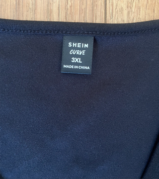 Body negro escote cruzado tirantes