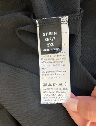 Camiseta negra peplum manga corta