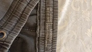 Vaquero elástico gris