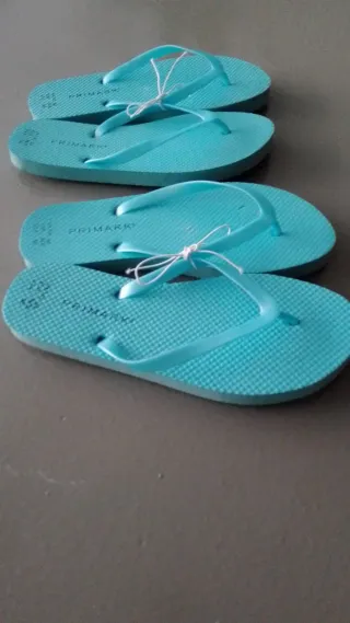 10 pares de chanclas de dedo, color azul turquesa