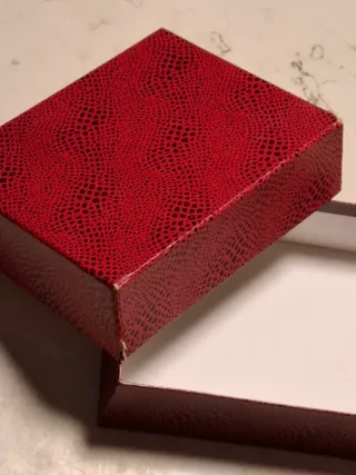 Bracciale rigido cuore martellato argento