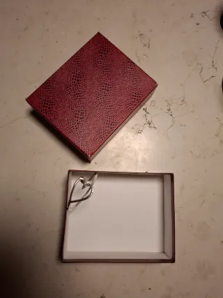 Bracciale rigido cuore martellato argento