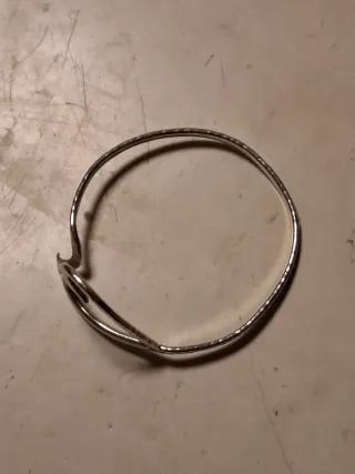 Bracciale rigido cuore martellato argento