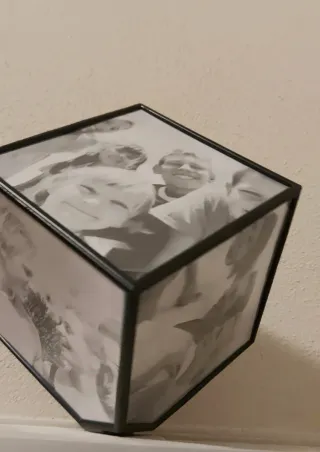 Cornice portafoto rotante