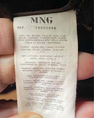 Abrigo de piel marrón con pelo