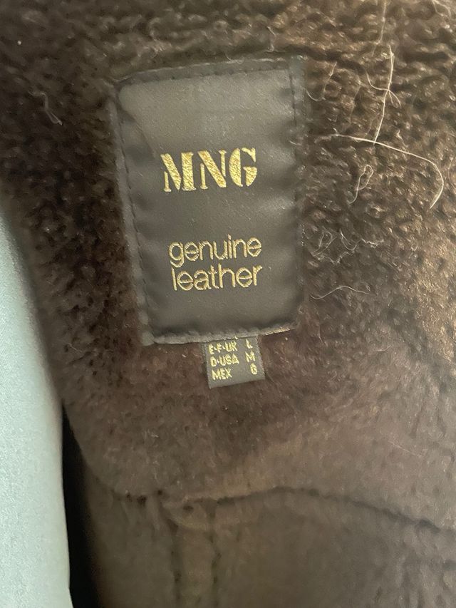 Abrigo de piel marrón con pelo