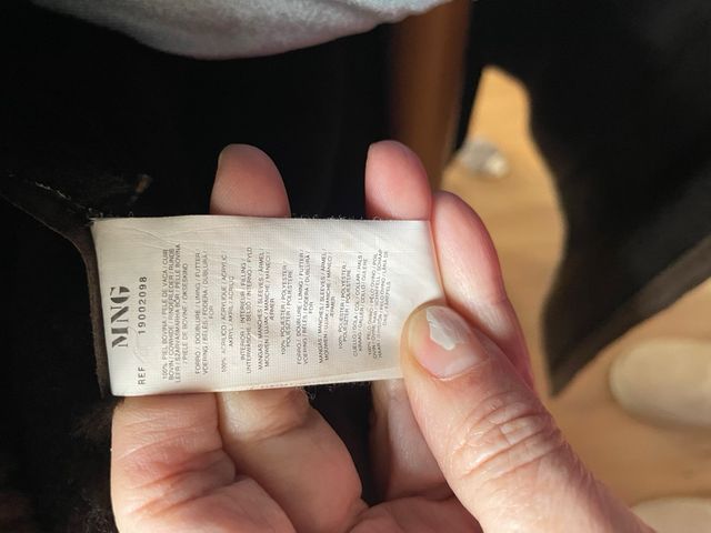 Abrigo de piel marrón con pelo