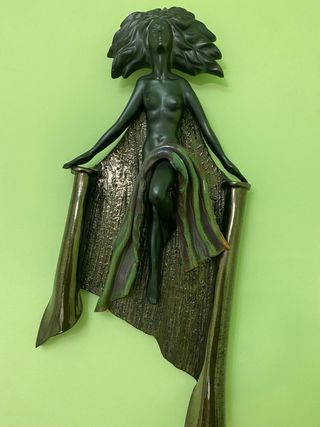 Juego de dos figuras decorativas de pared