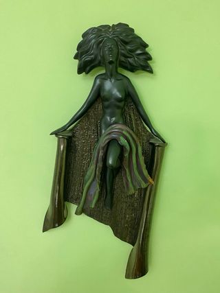 Juego de dos figuras decorativas de pared