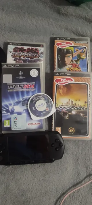 PSP Nera con 5 giochi, scheda da 1G, custodia e caricatore