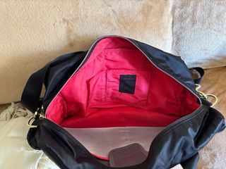 Bolsa de viaje Samsonite negra y fucsia